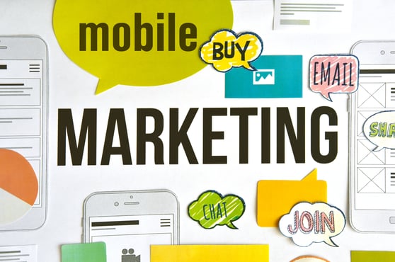  Visual concept of a mobile marketing guide with speech bubbles showing key mobile actions like email and chat.