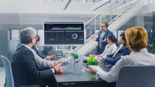 Team presenting AI-powered lead generation analytics in a business meeting.