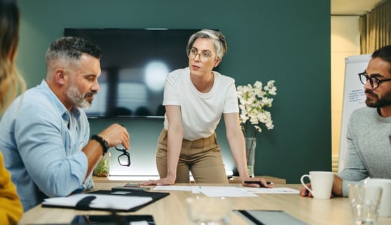 Businesswoman leading a meeting with her colleagues in a boardroom