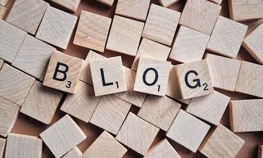 Wooden blogs with letters, spelling out BLOG.