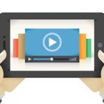 Graphic of person holding a tablet, with video playing.