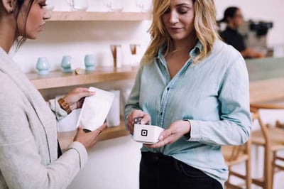 woman-customer-using-stripe-payment-processor