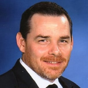 Professional photo of John Simmons used in WSI banner